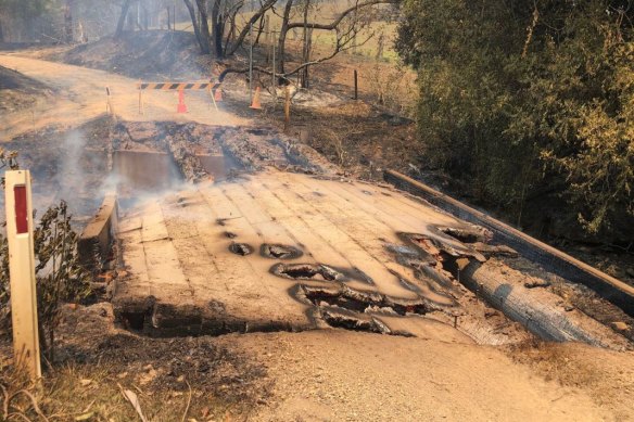 The bridge over South Arm creek was burnt out during last week's fires. Residents believe Mr Savva rolled his car when he was reversing away from the bridge.