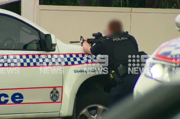 Police have shot dead an armed man in Ipswich, south-west of Brisbane.