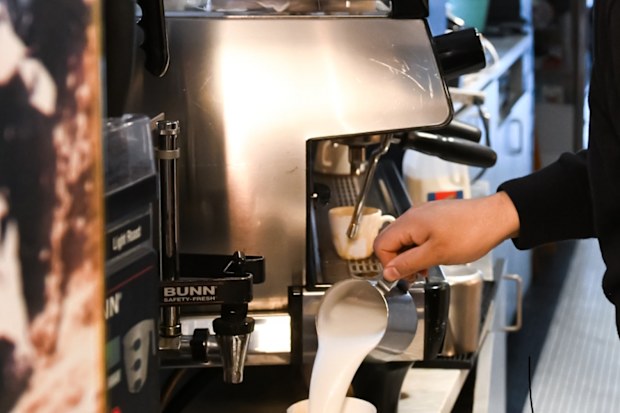 Barista making coffee
