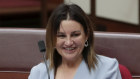 Jacqui Lambie is prepared to consider the government's revamped Ensuring Integrity Bill.