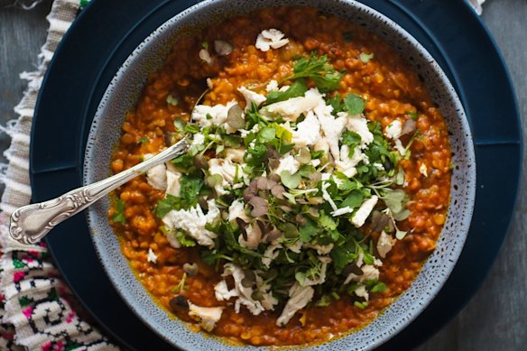This butter chicken-inspired dhal can be made vegetarian - just swap the stock and hold the shredded chook (pictured as a topping).