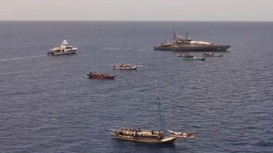 The Maritime Border Command (MBC) operation, seen driving illegal foreign vessels from the Rowley Shoals last month.