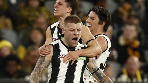 Jordan De Goey celebrates a key goal against the Tigers.