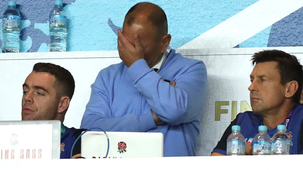 Can't look: Eddie Jones watches his side get bulldozed by South Africa.