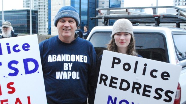 Dave Nelson with his daughter Claire at a police rally last year.