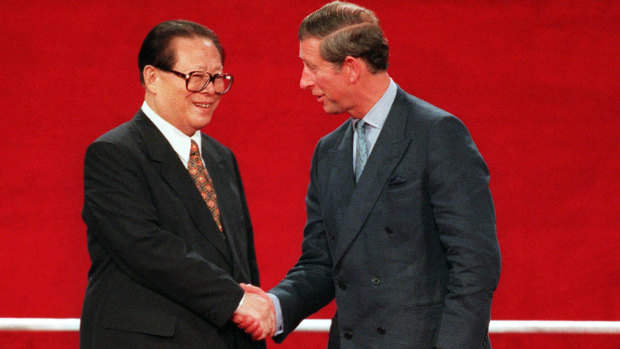 Chinese President Jiang Zemin, left, shakes hands with Prince Charles during the handover ceremony of Hong Kong to Chinese rule July 1, 1997. 