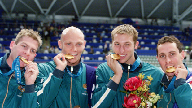 Todd Pearson, Michael Klim, Ian Thorpe and William Kirby celebrated gold for Australia after the 4x200m freestyle relay.