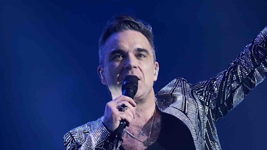 Robbie Williams in concert at Rod Laver Arena earlier this year, while filming his upcoming satirical biopic Better Man.