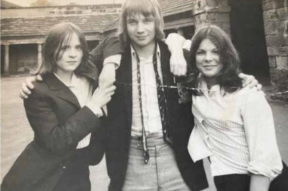Wood aged 14 (right), with school friends Jane and Chris.