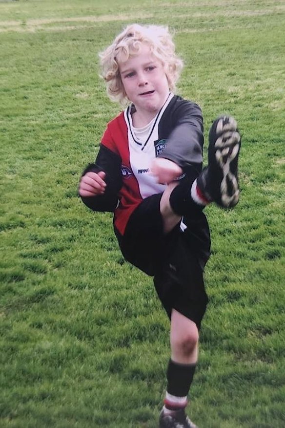 James Rendell showing early kicking skills.