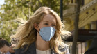 Elizabeth Holmes leaves the United States Federal Courthouse in San Jose.