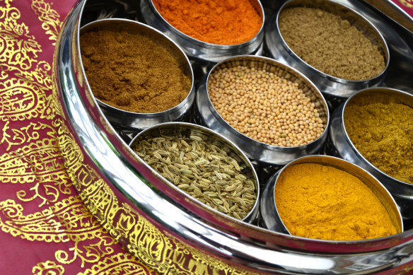 A masala dabba is traditionally used to store Indian spices for cooking.