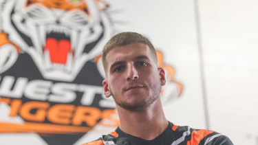 When Wests Tigers star Adam Doueihi was asked by reporters what he was doing with his free time as a result of the new self-isolation rules on Wednesday, he joked around about his team "bonding" through video games. 