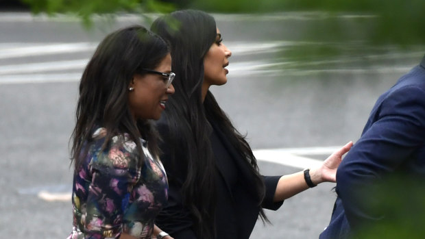 Kim Kardashian, second from left, leaves the West Wing of the White House in Washington on Wednesday.