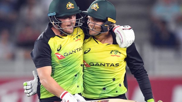 Finish line: Aaron Finch and Alex Carey in brighter times.