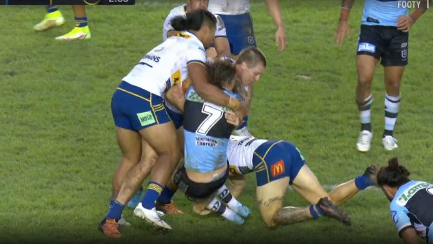Ray Stone tackles Nicho Hynes around the legs in an apparent ‘cannonball’ tackle.