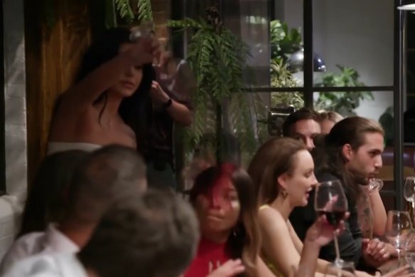 Dinner party drama on MAFS. Martha throws a glass of red wine over Cyrell.