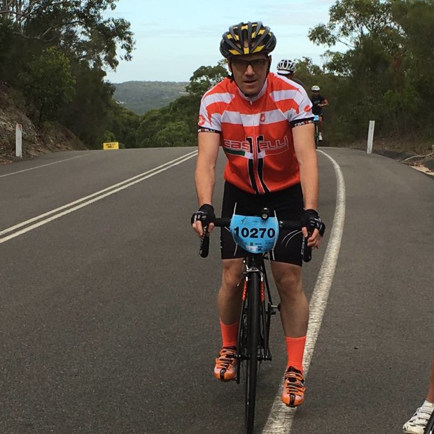 Peteris (in red) climbing a hill during Sydney's Bobbin Hill Classic Bike Ride in April 2016. Only four months later, the first symptoms of MND appeared. 