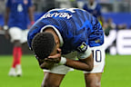 Mbappe reacts to the loss.