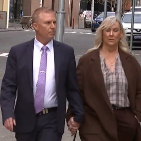 James Hayward and his wife enter Perth District Court.