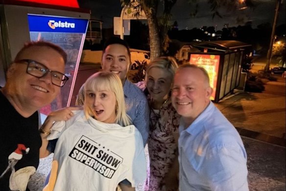 Redlands CEO Louise Rusan (second from right) with Beaumont (third from right), Daly (holding the shirt).  