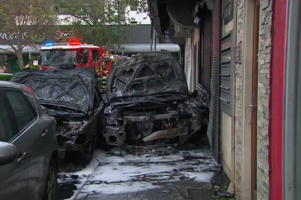 It's understood a stolen Holden Cruz was parked outside the tobacco shop and set alight.