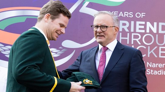 Prime Minister Anthony Albanese and Prime Minister of India Narendra Modi present caps during the fourth test of the Border-Gavaskar Trophy in 2023. 