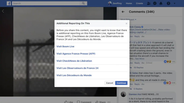 Facebook added a warning label to the video of a spinning plane after fact checkers called it false. 