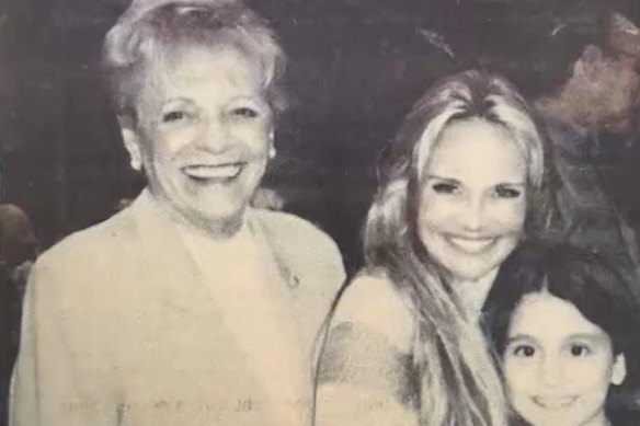 Grande with her late grandmother, Marjorie Grande, and Kristin Chenoweth, who originated the role of Glinda on Broadway. Here, they are pictured backstage at Wicked in 2003.