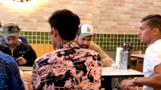 India players eating at a restaurant in Melbourne, seemingly in breach of their biosecure bubble.