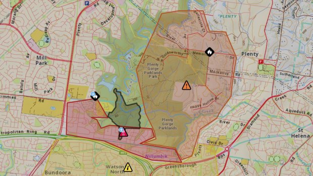 The area affected by the Plenty Gorge bushfire (shaded in black). People in the orange shaded areas are being urged to leave the area ahead of a wind change about 8pm. 