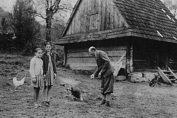 Pixie Shmigel’s grandmother Nadia Gladyshowsky (left), great-aunt Olya (centre) and great-grandfather Oleksandr on the family farm in Ukraine, circa 1943.