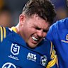 Eels hooker Ryley Smith is helped off.