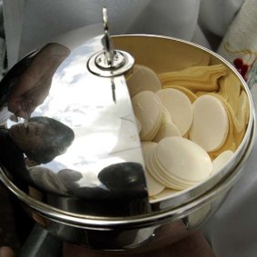 The coronavirus outbreak has resulted in changes to the Catholic church's holy communion. 