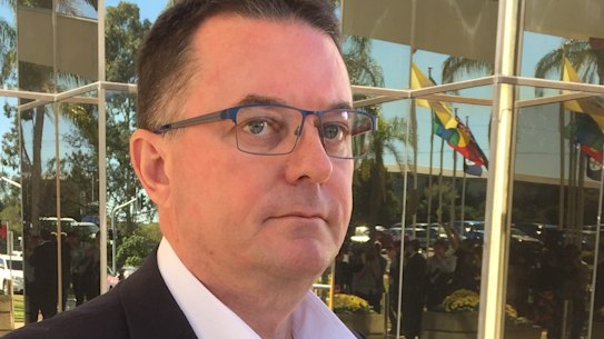 Logan mayor Luke Smith with the letter from Local Government Minister Stirling Hinchliffe, which formally suspended him on Tuesday, May 22, 2018.