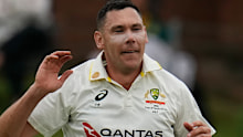 Scott Boland celebrates after taking the wicket of South Africa’s David Bedingham.