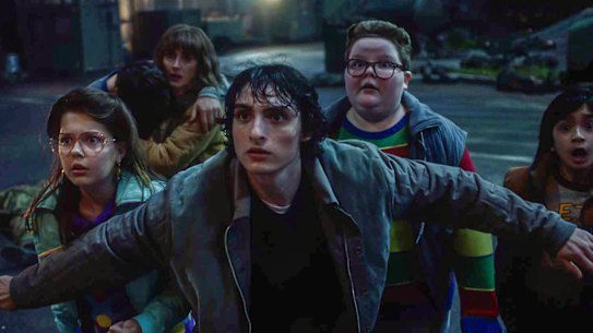 Finn Wolfhard as Mike Wheeler (front) in season five of Stranger Things.