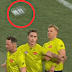 Umpired pelted with bottles as they leave the field. 