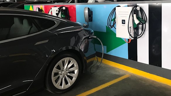 The NSW government will redirect EV subsidies into more charging stations in car parks and apartment blocks .