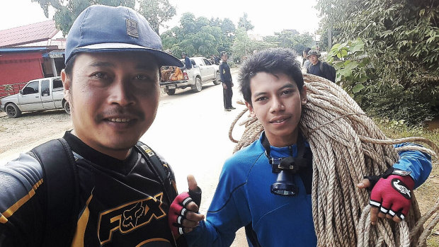 Locals prepare to take the birds' nest team into the mountains in Khun Nam Nang Norm National Park to find alternative ways into the cave.