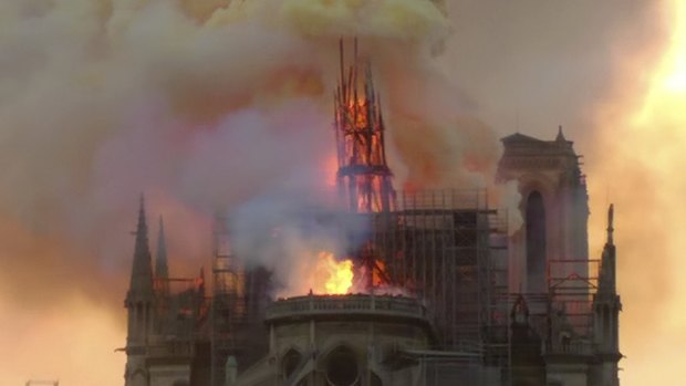 Flames and smoke rise from Notre-Dame Cathedral in Paris.