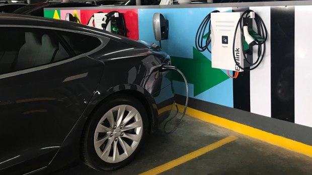 The NSW government will redirect EV subsidies into more charging stations in car parks and apartment blocks .