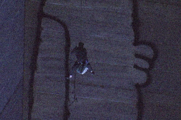 The vandal abseiled down the concrete stack in the early hours of Tuesday.