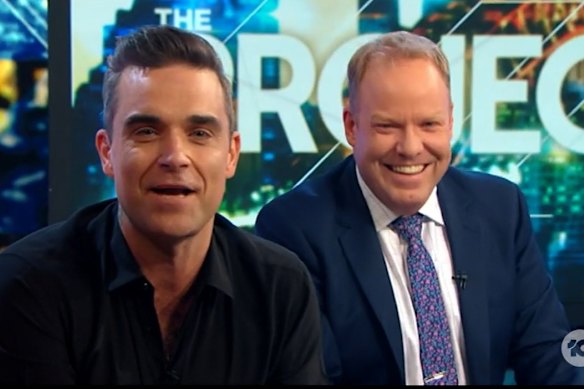 British singer Robbie Williams with Peter Helliar on The Project.