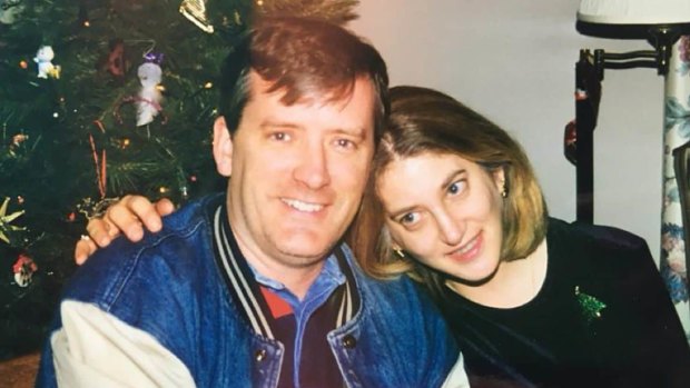 A family photo of Andrea Chamblee and her late husband, John McNamara, at Christmas time circa 1997.