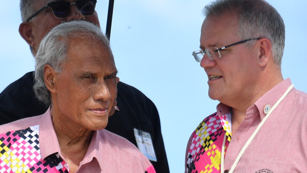 Tonga's late Prime Minister 'Akilisi Pohiva, left, with Prime Minister Scott Morrison in Tuvalu last month.