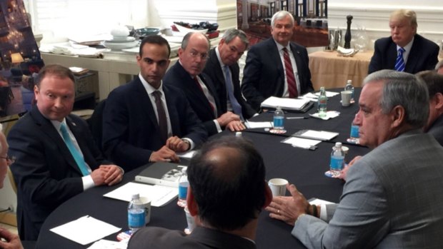 George Papadopoulos, second from left, sits at a table in March 2016 with then-candidate Donald Trump.
