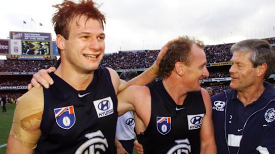 Aaron Hamill (left) celebrates the 1999 preliminary final win with Craig Bradley and David Parkin.