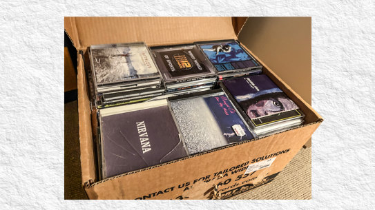 A box of CDs sit in our attic.