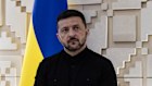 Ukrainian President Volodymyr Zelensky waits to speak to media after his meeting with Turkish President Recep Tayyip Erdogan.